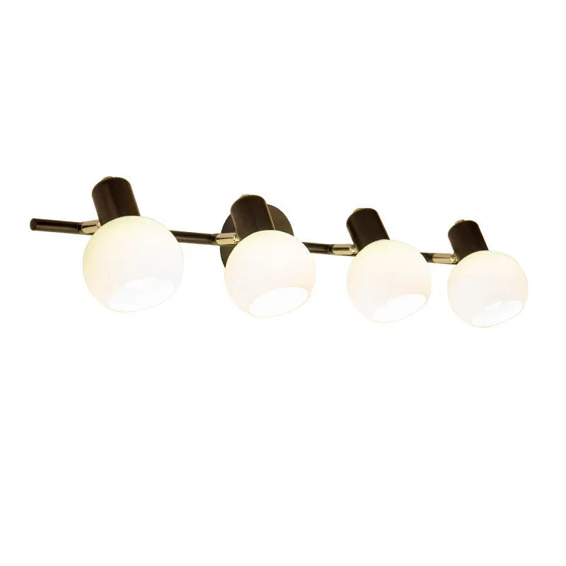 LED wall-mounted washstand mirror front lamp in American simple style, black finish, installed above a bathroom mirror