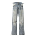 Men's blue straight-leg jeans with distressed ripped details and a zipper fly.