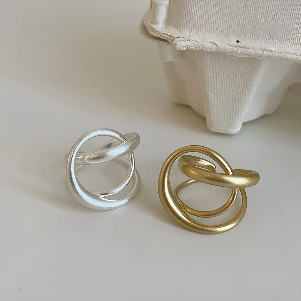 Three-dimensional interlaced geometric open ring in matte gold or silver electroplated finish