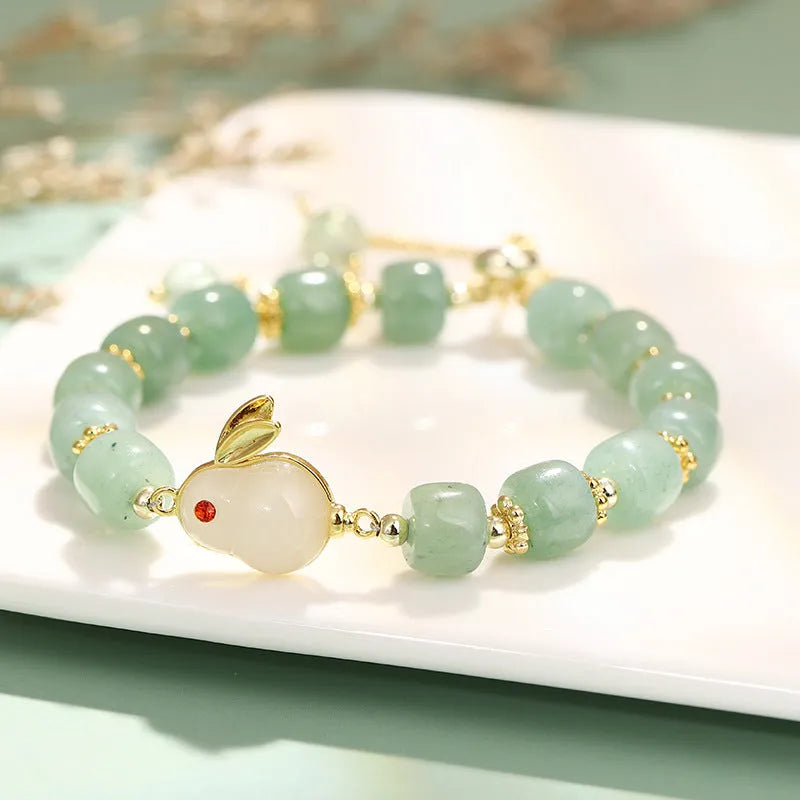 Rabbit bracelet with green aventurine and strawberry quartz beads, copper and gold-plated details