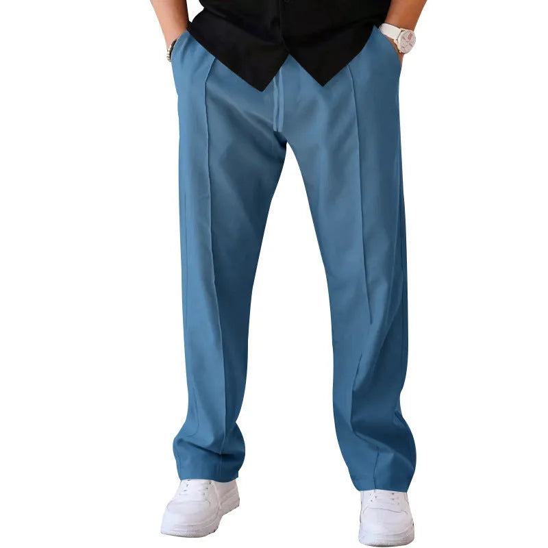 Men's loose straight trousers in waffle polyester with drawstring, available in multiple colours including black and light grey