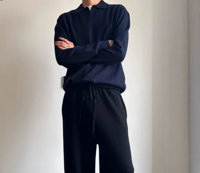 Pure wool polo sweater with lapel collar in milky white, shown in a loose fit.