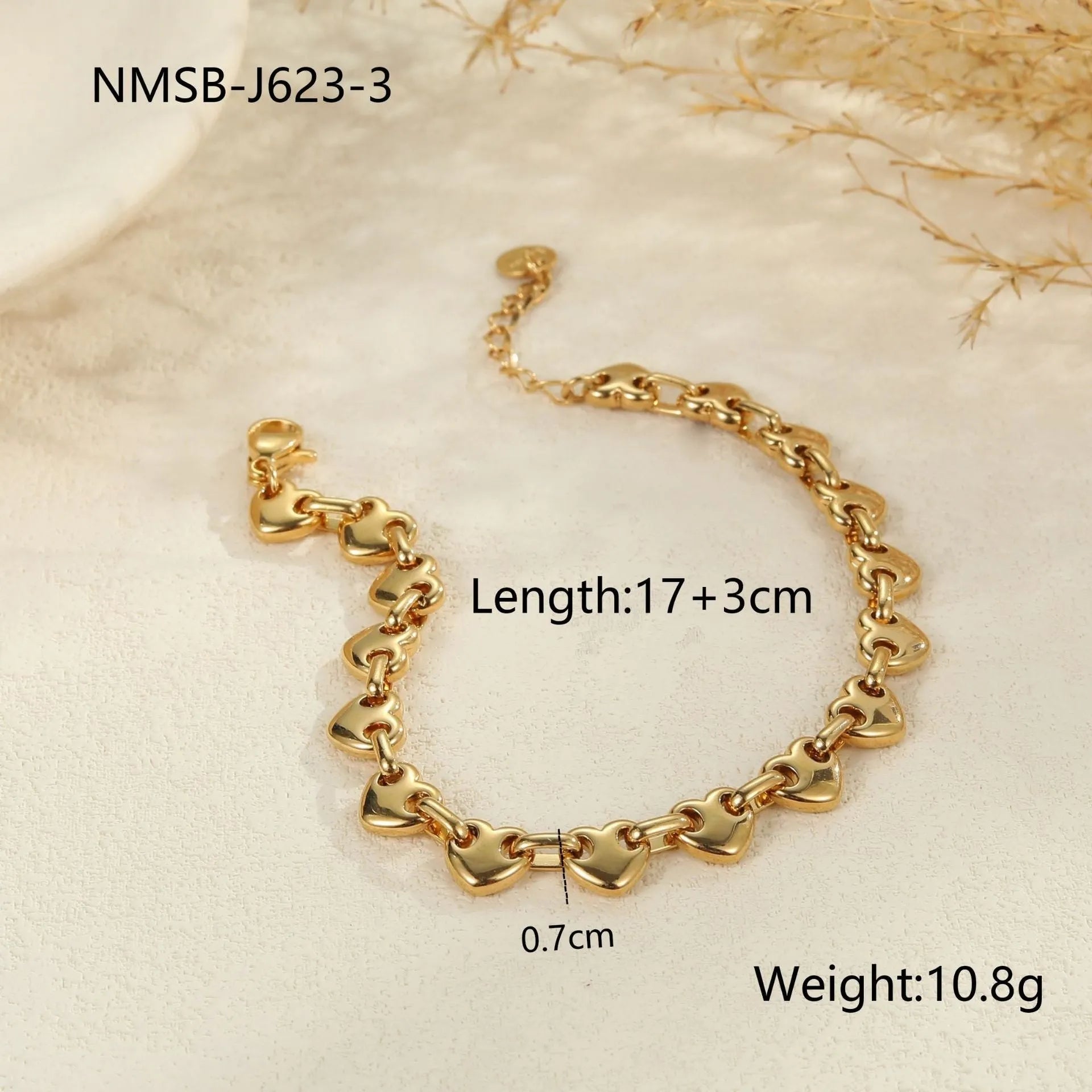 18K stainless steel hollow heart bracelet for women in gold, steel, or colour-blocked finish.