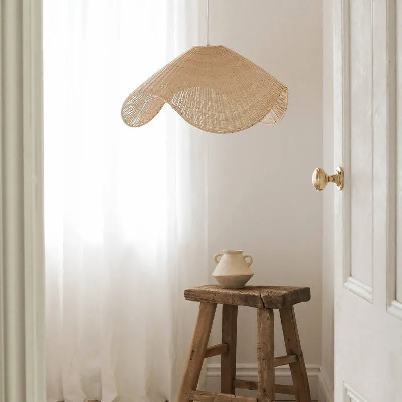 Handmade natural rattan and willow pendant chandelier with warm LED light.