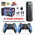 X2 Blue game console with two wireless controllers and HDMI cable on a table