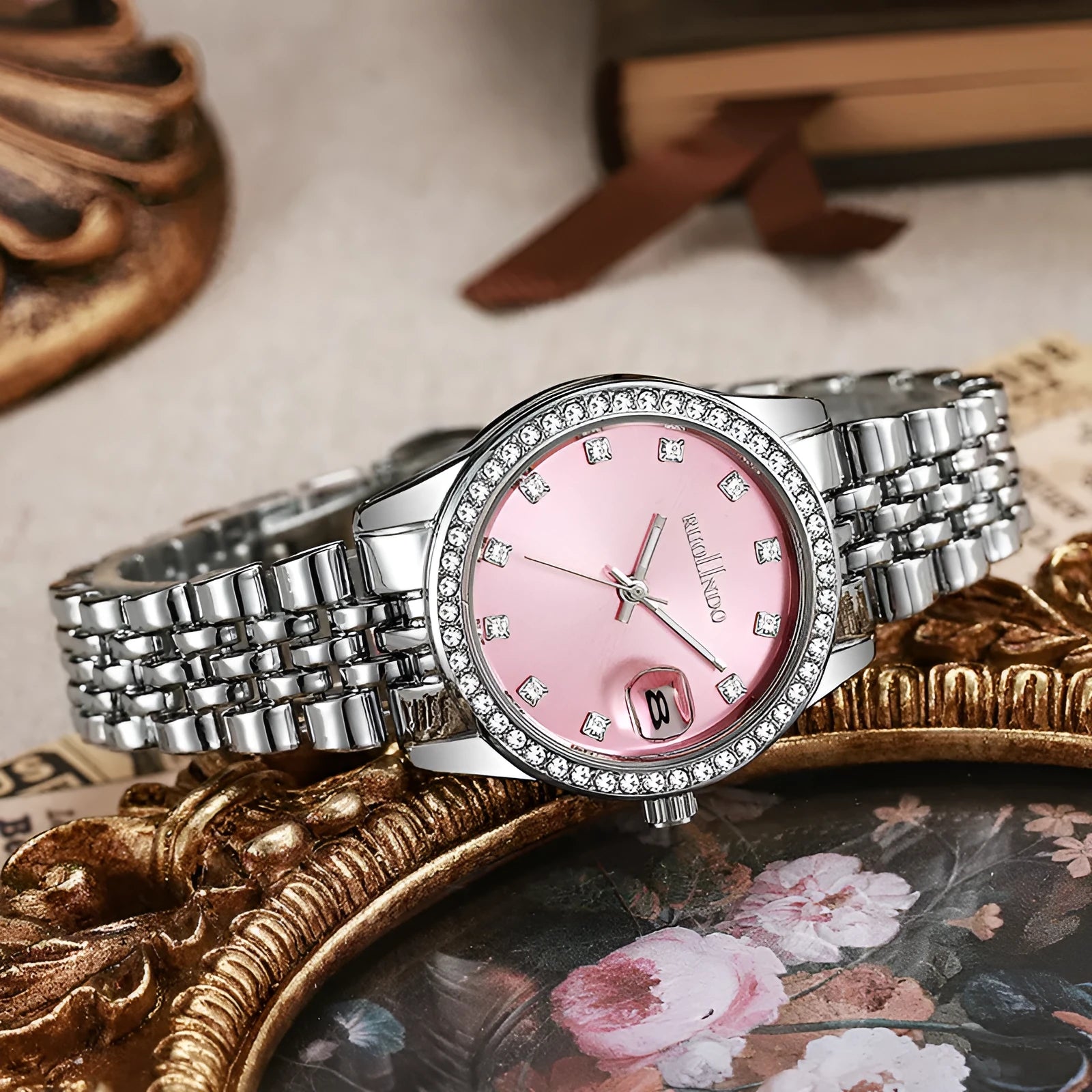 Women's silver quartz calendar watch with 32mm dial and stainless steel buckle