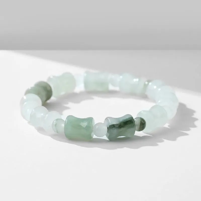 Tianshan Emerald natural chalcedony diamond-shaped stone bracelet with coconut shell beads and safety lock on elastic string.