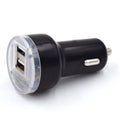 Black or white two-port car charger plugging into a 12V vehicle socket for in-car USB charging