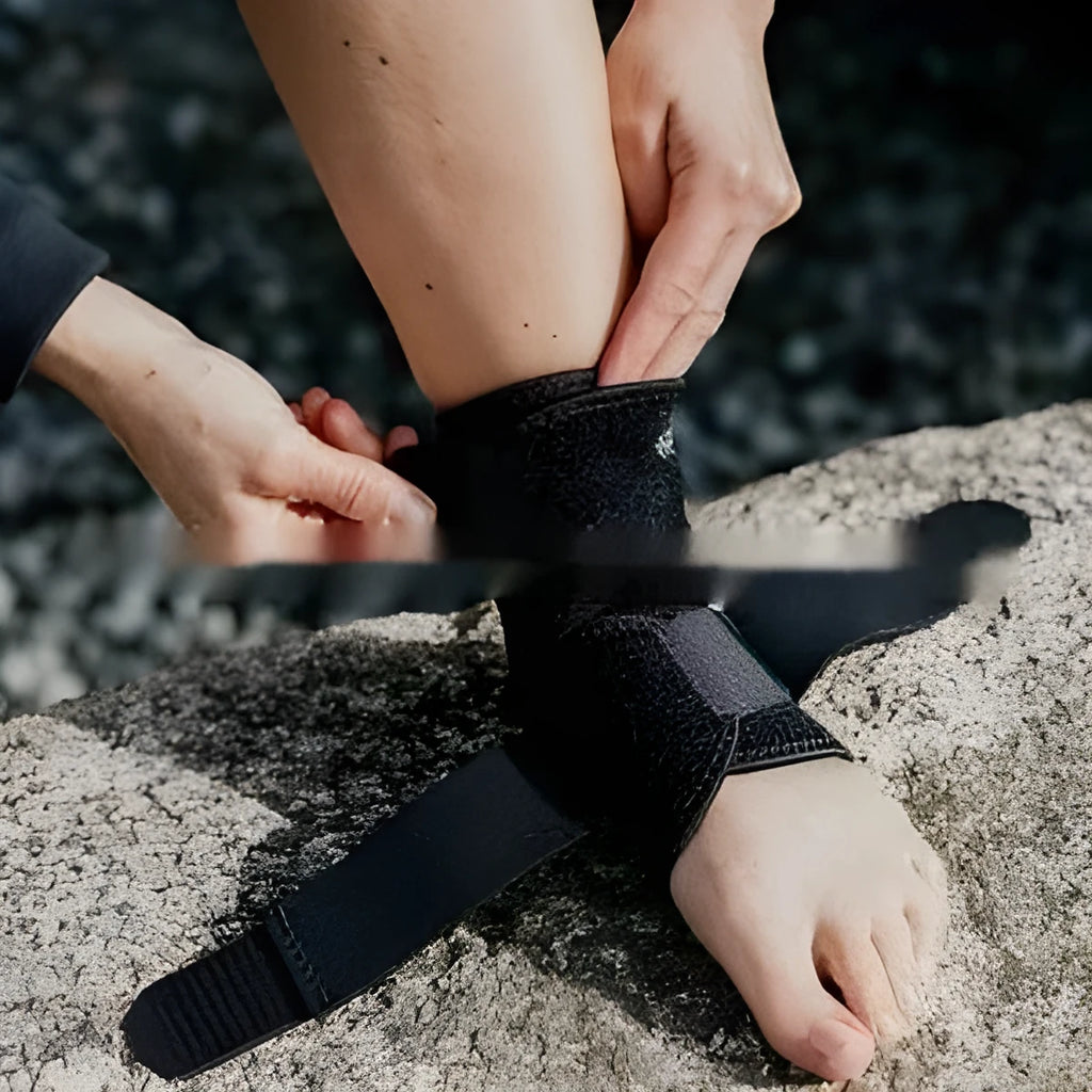 A black sports ankle support protective gear for basketball, football, running, and fitness activities.