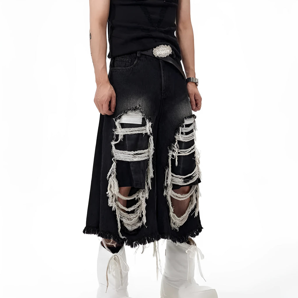 Black cropped wide-leg women's jeans with a ripped patch detail and a mid-high waist.
