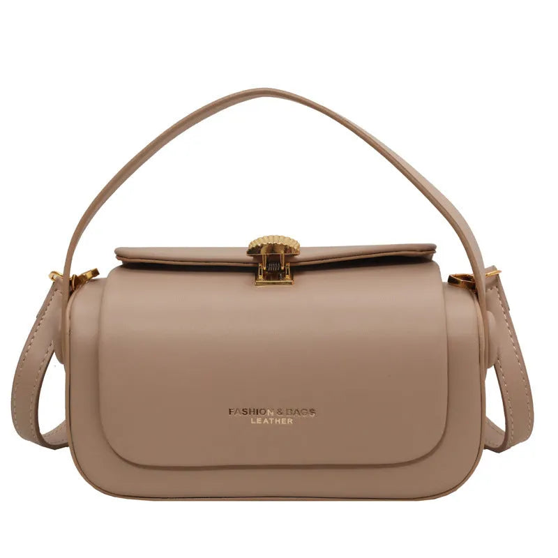 Women's personalised shoulder messenger bag in beige with a monogram letter and adjustable strap.