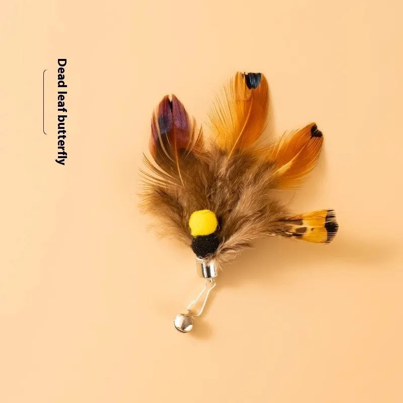 Three steel wire cat toy replacement heads shaped like small flying insects, shown against a plain background.