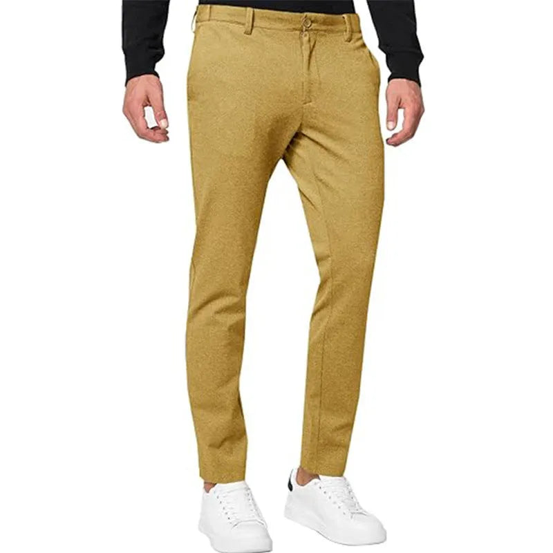 Men's slim-fit tapered chino trousers in Army Green colour, showing zipper fly and casual styling.
