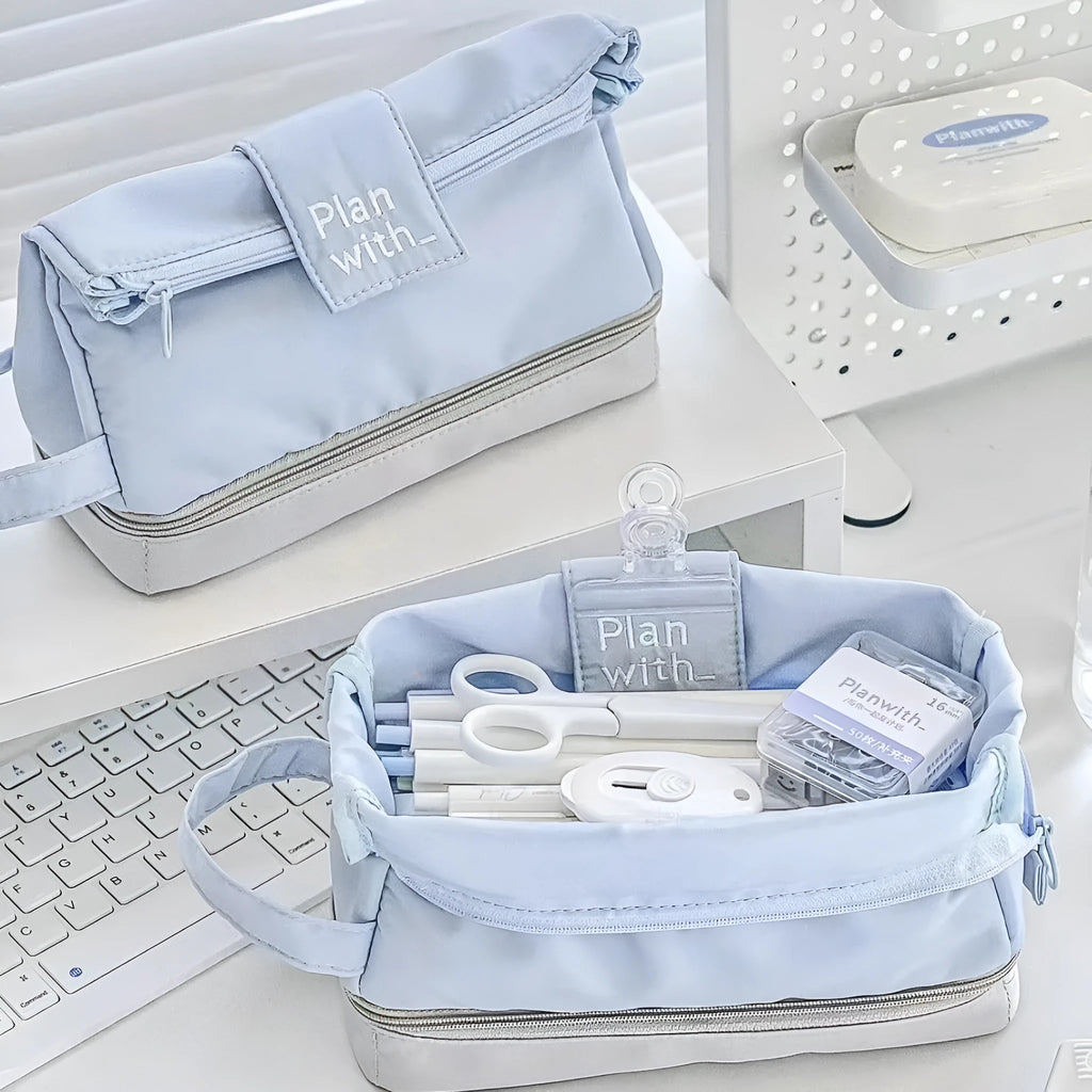 Folding double layer pencil case in beige, blue, and navy blue colour options
