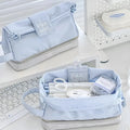 Folding double layer pencil case in beige, blue, and navy blue colour options