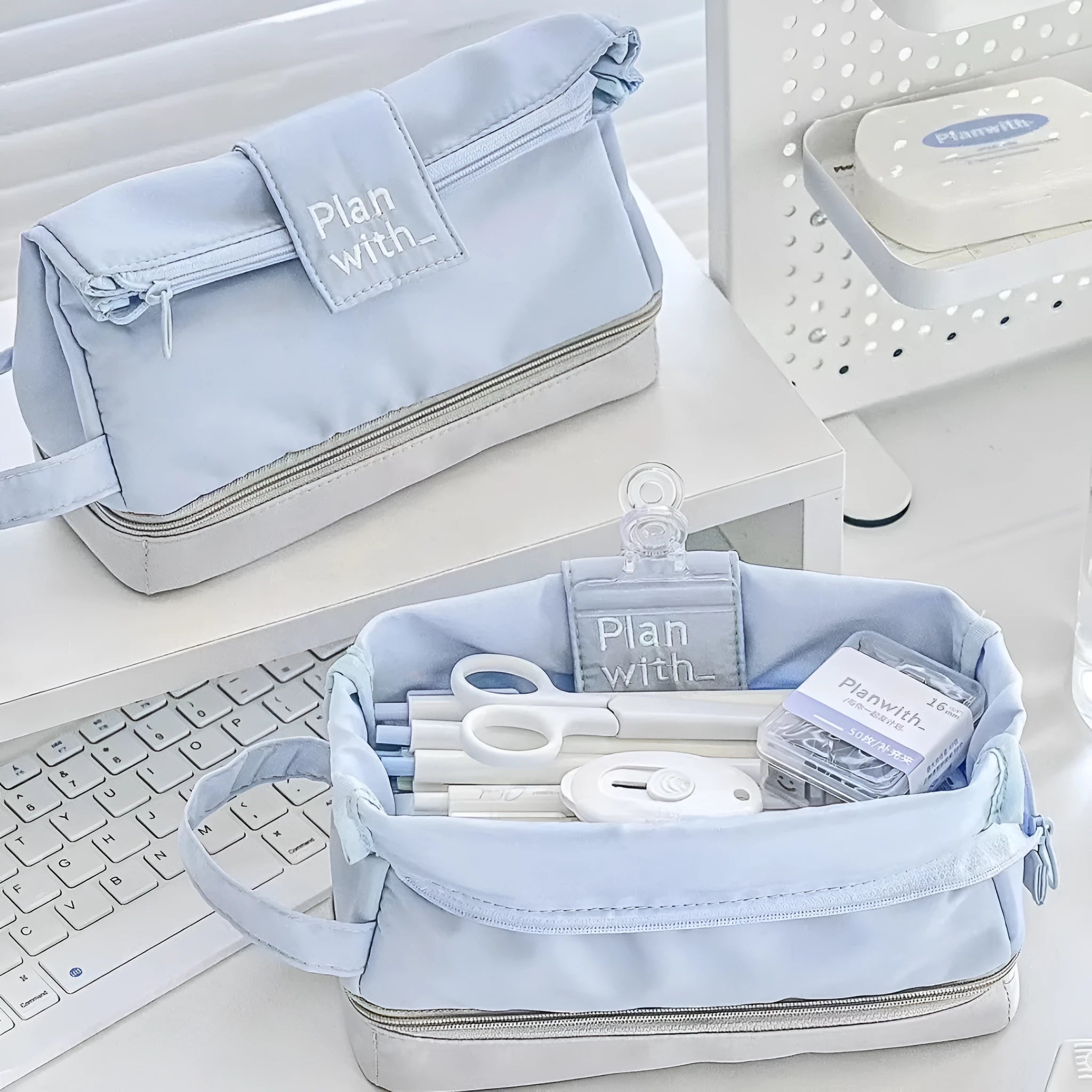 Folding double layer pencil case in beige, blue, and navy blue colour options