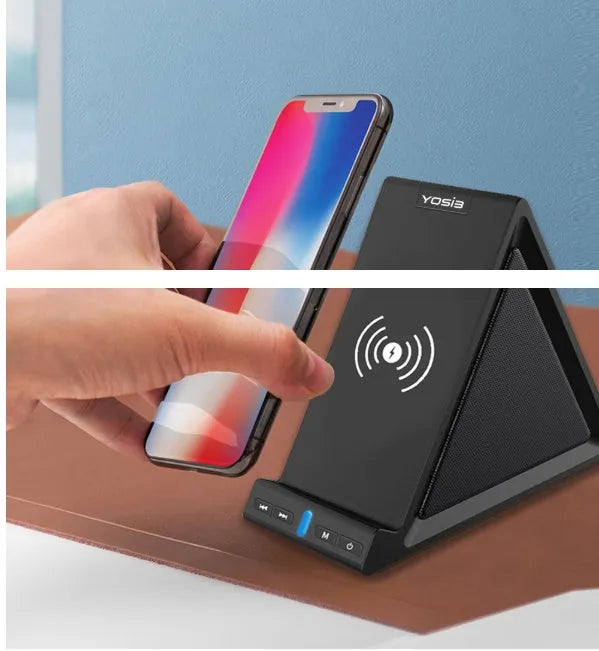 Black multifunctional Bluetooth speaker with integrated phone stand and wireless charging pad, showing size scale.