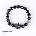 Handmade Chinese national style obsidian bracelet with lying rabbit charm and mixed metal and agate beads.