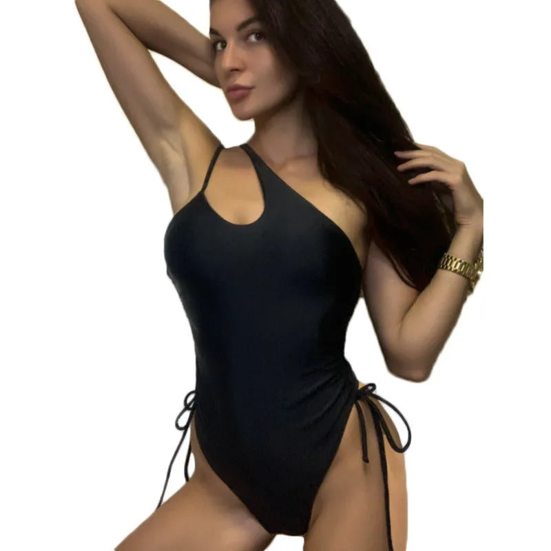 Black sleeveless bodycon dress with lacing and sloping shoulder, tight fit, 70-80cm length, sizes S-XL.