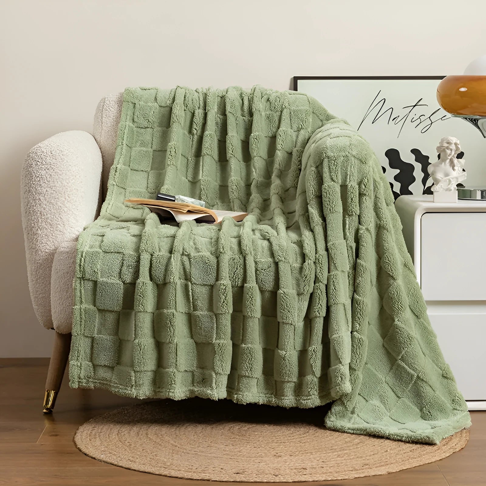 Geometric pattern polyester blanket in lake blue colour showing thickened texture