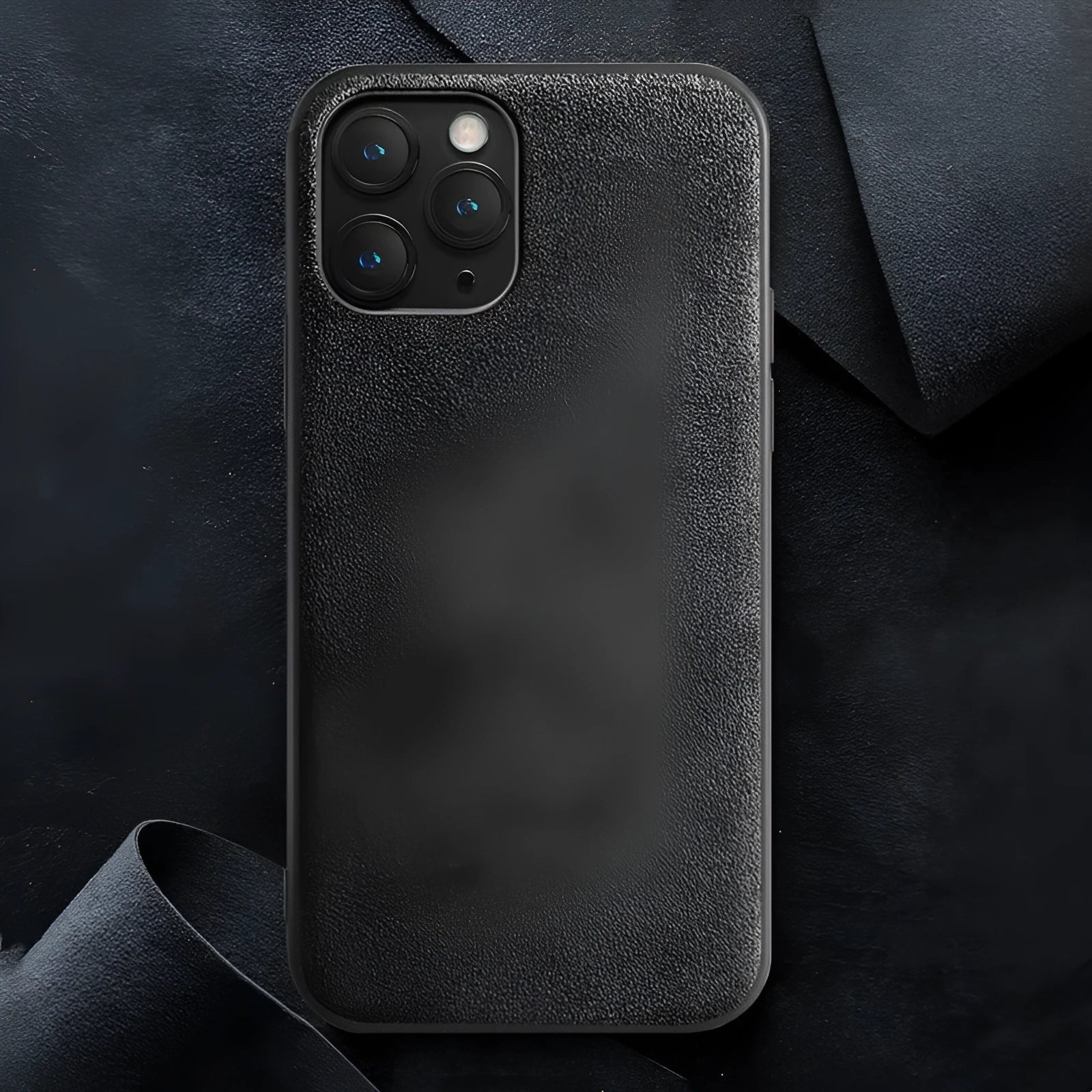 Suede iPhone case in dark blue colour showing full-cover protection and precise cutouts for ports and camera.