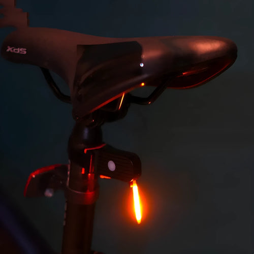 USB-charging waterproof bicycle rear taillight in blue, pink, red, white, or yellow colour options