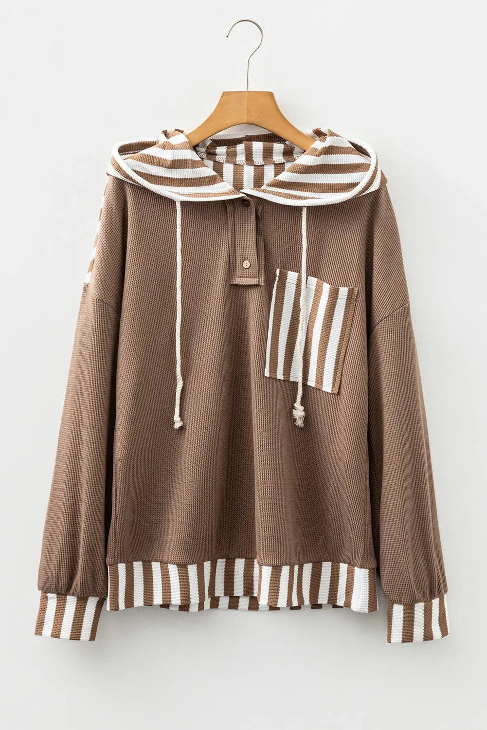 Straw yellow women's hoodie with waffle texture, patchwork stripes, button neck, and drawstring hood.