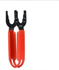 Orange handled forged steel pipe wrench with jaw open, showing serrated teeth on a grey background.