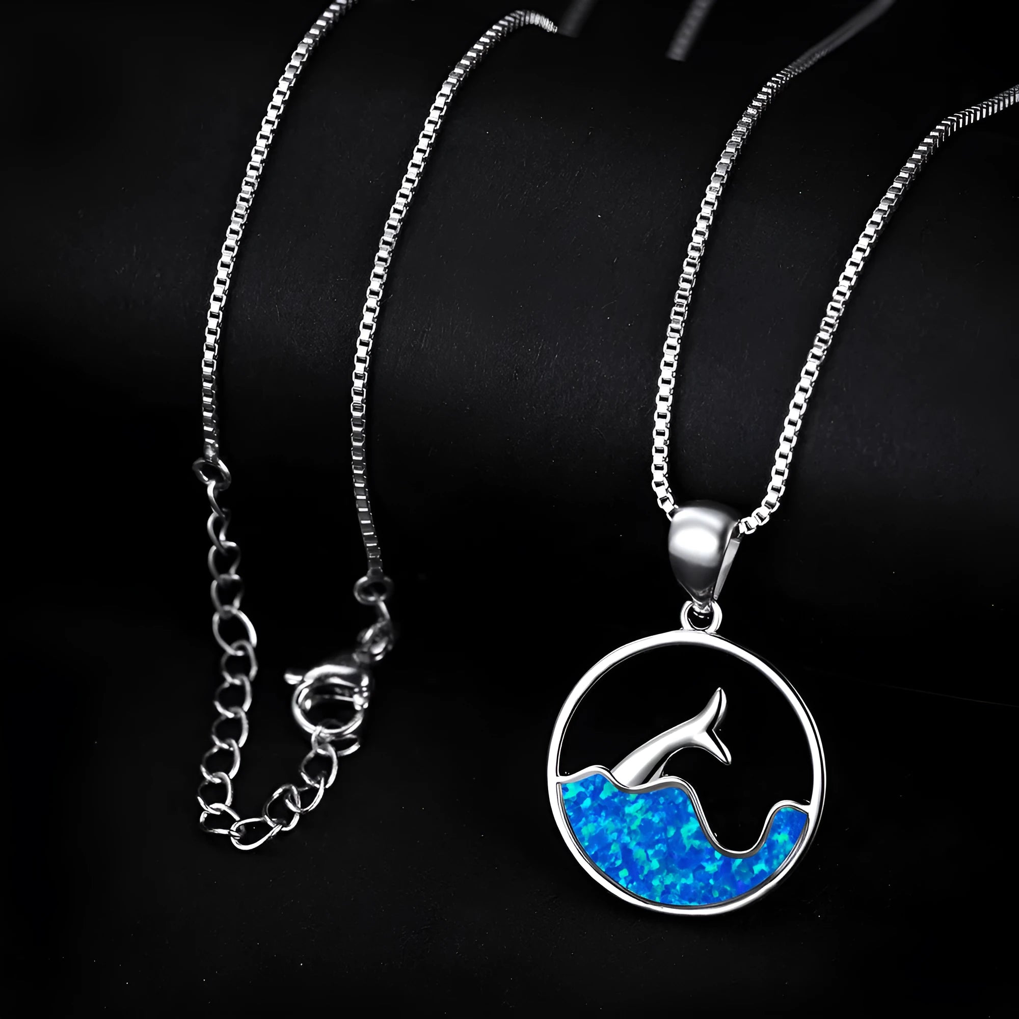 Geometric sea fishtail pendant necklace in electroplated blue opal colour on a copper chain.