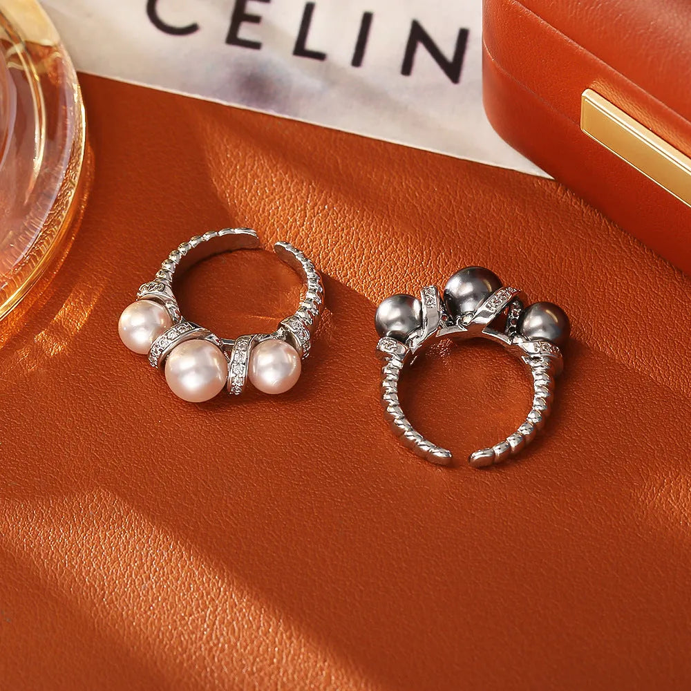 Open-end ring with round pearl element in grey colour, real gold plated copper base, unisex geometric style