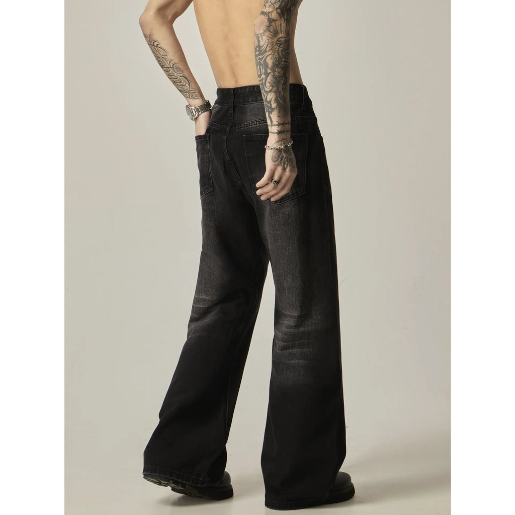 Man's black loose-fit straight-leg retro jeans made from polyester denim fabric.