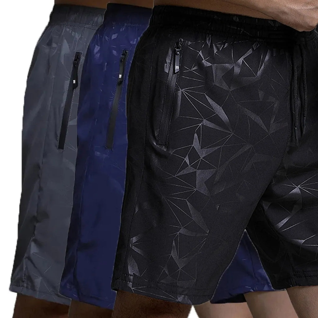Men's loose-fit black polyester sports shorts with elastic waistband laid flat.