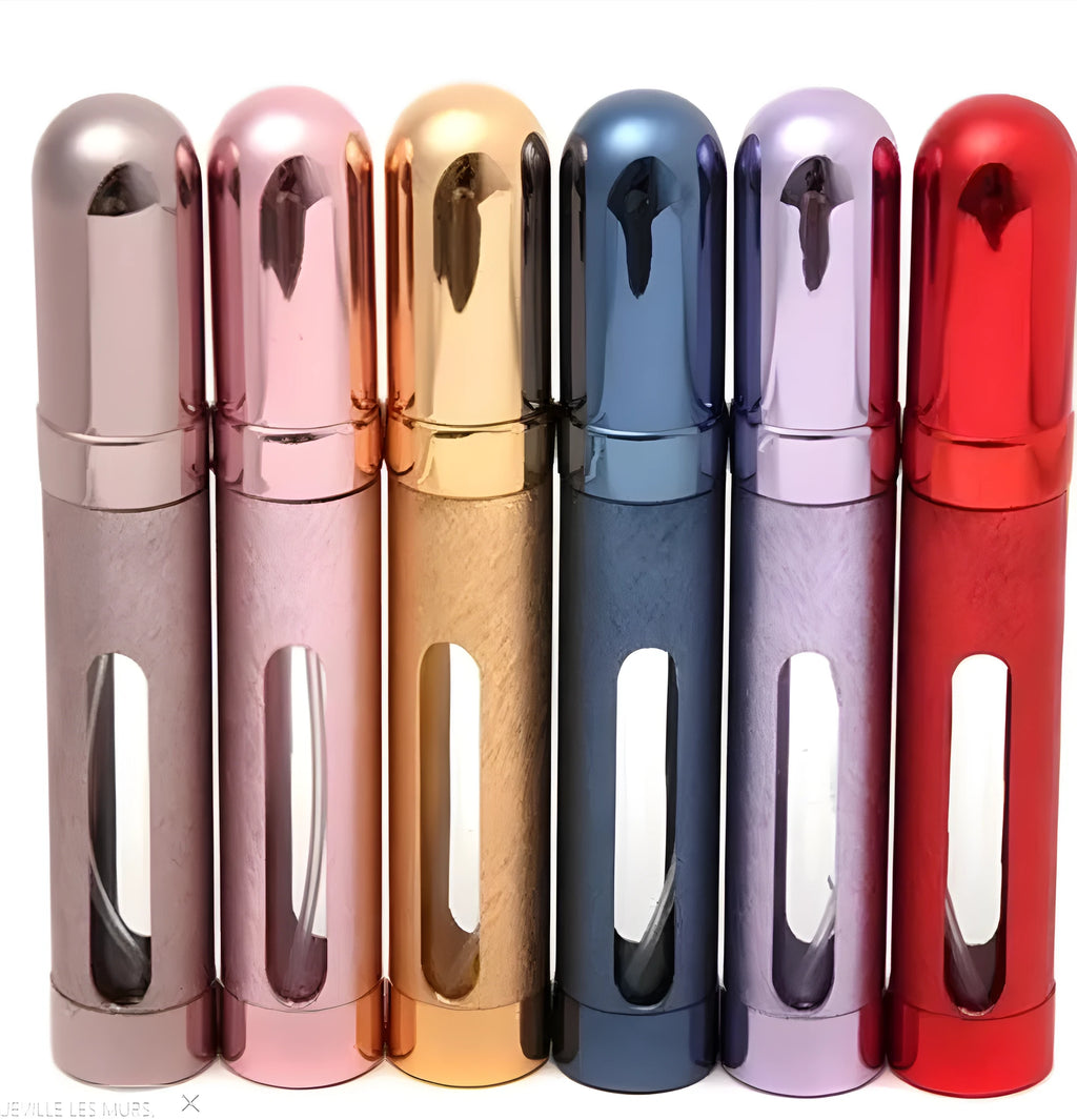 Refillable aluminium travel perfume atomiser with glass liner in blue, gold, pink, red, silver, or violet.