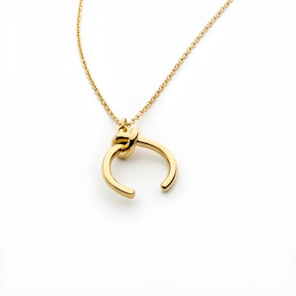 Gold or silver electroplated vintage geometric pendant necklace on an adjustable copper cross chain.