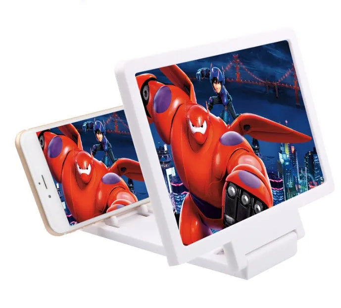Black and white 3D mobile phone screen amplifier acting as a phone stand on a table