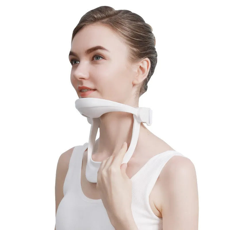 White adjustable neck support brace for cervical spine and shoulder posture correction.