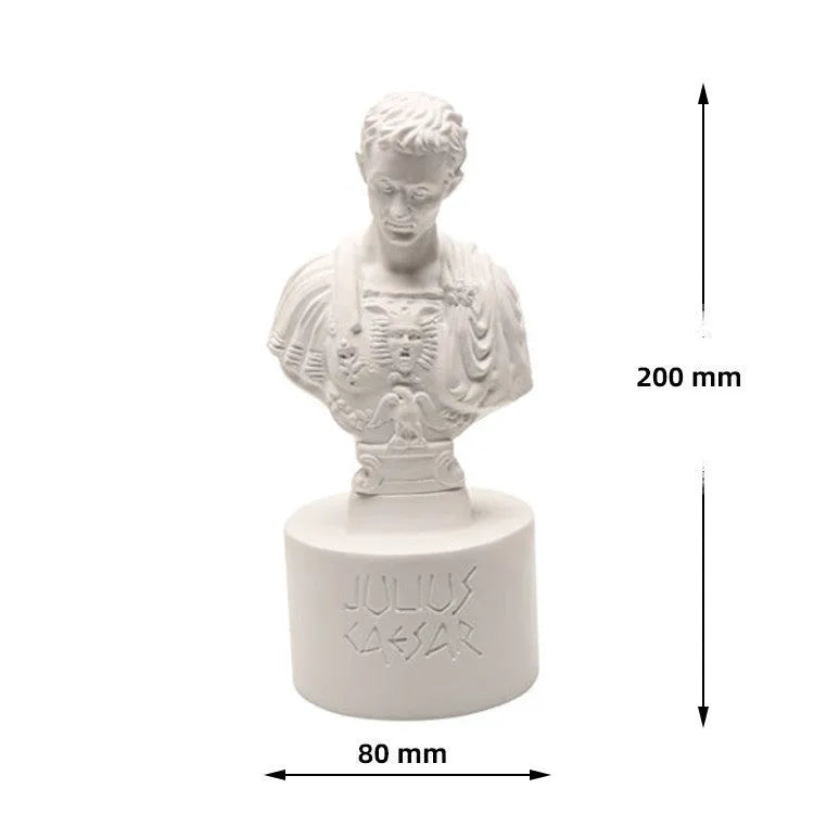 White synthetic resin pen holder with American creative character modelling on a desk.