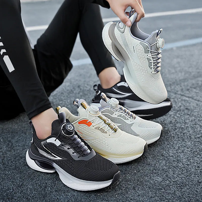 Low-top white running shoes with a rotating button buckle on a breathable mesh upper and a textured TPU sole.