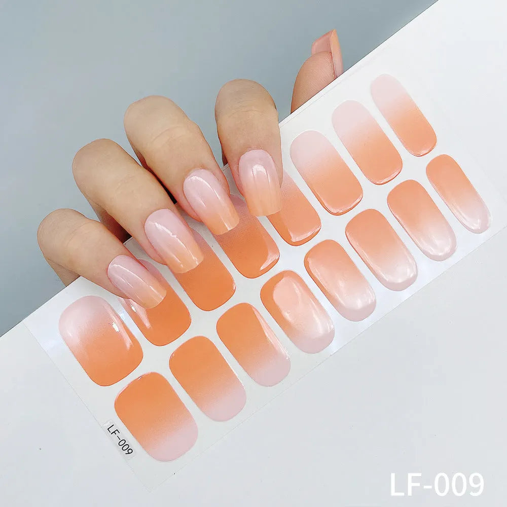 16 solid colour full nail art stickers with 22 patterns including cross, rose, butterfly designs in 12x6mm oval size