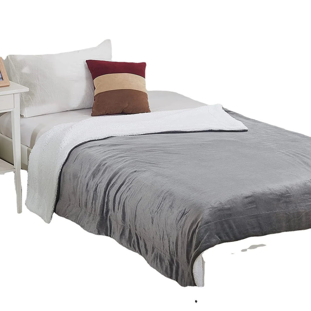 Grey, brown and white USB electric heating blanket with intelligent temperature controls on soft flannel fabric.
