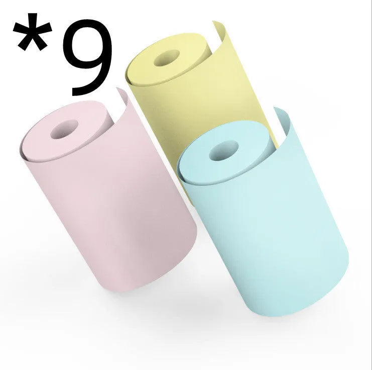 Bluetooth mobile mini thermal printer in pink with paper rolls and USB cable