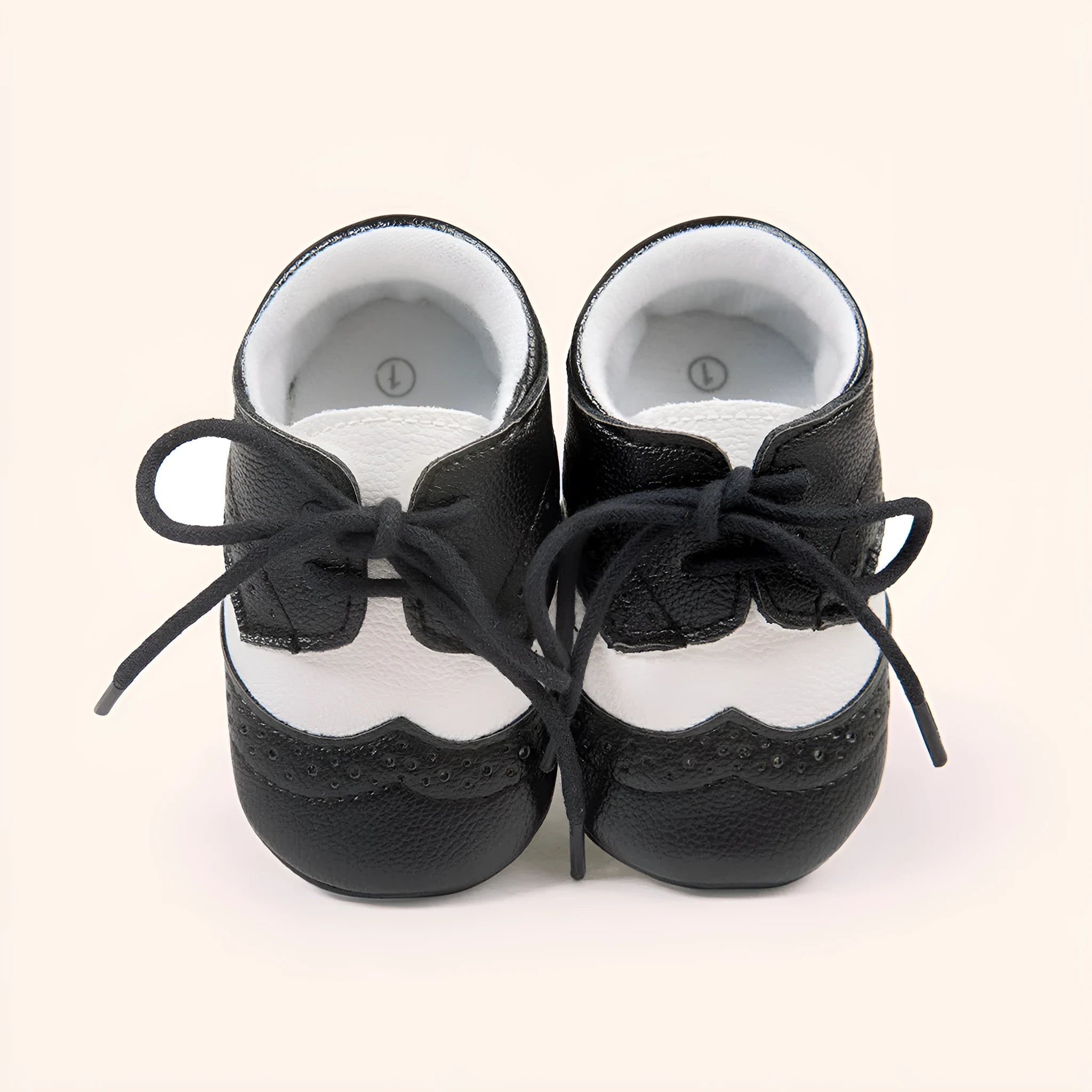Men's vintage-style baby walking shoes in synthetic leather, shown in light brown colour.