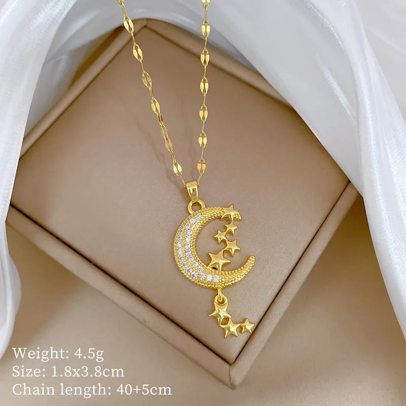 Moon Tassel Necklace showing geometric copper pendant with diamonds and tassel on a stainless steel chain.