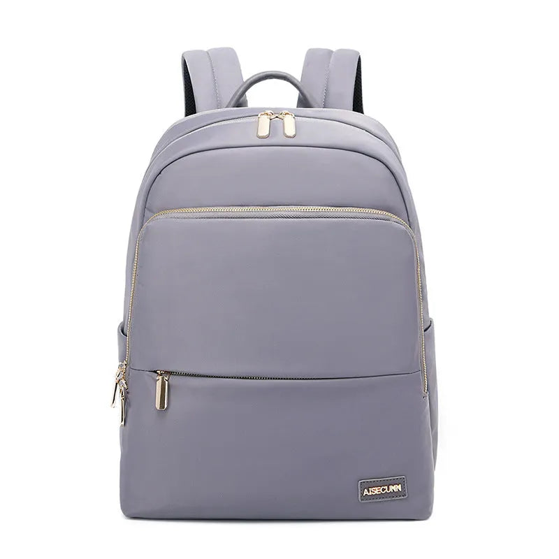 Women's large Oxford cloth backpack in black, showing front compartment and breathable back panel