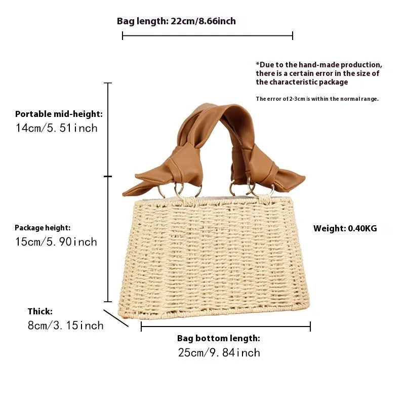 Portable woven straw bag in beige with hard trapezoid shape and double shoulder straps for seaside vacation daily use.