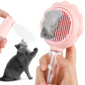 Grey spray cat brush with release button for grooming pets and removing loose hair.