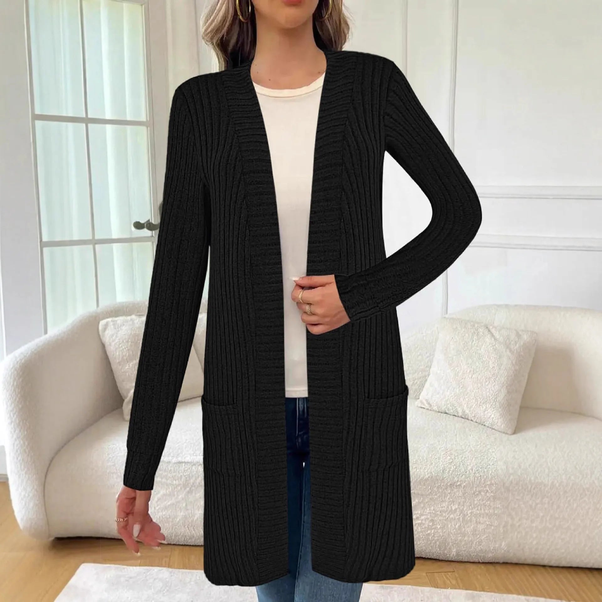 A loose-fitting long sleeve cardigan jacket with pockets, shown in black, wine red, and grey colour options.