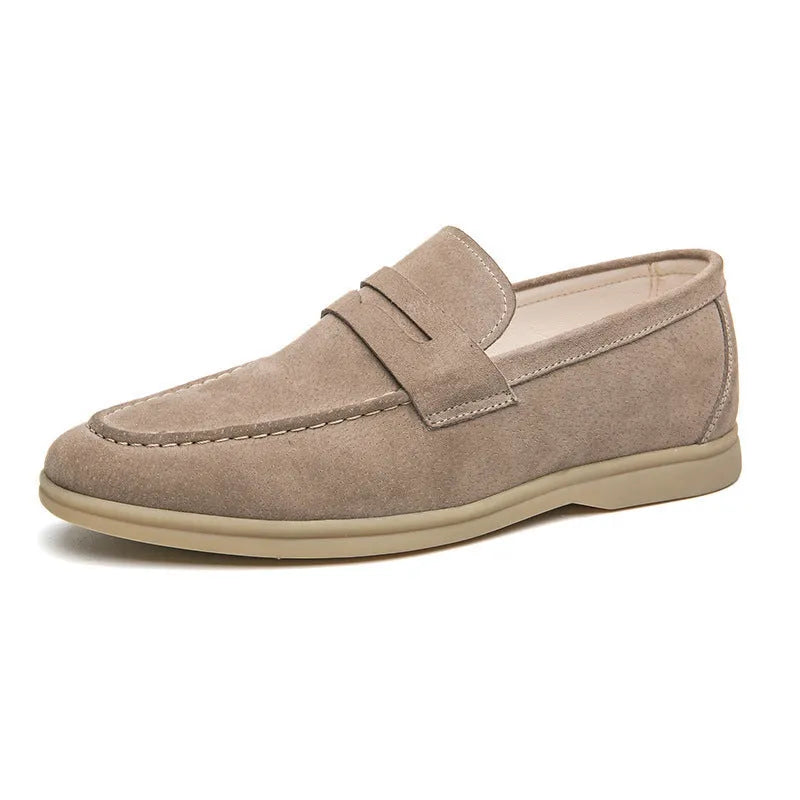 Men's beige slip-on leather casual shoes with a round toe and mid-height rubber sole.