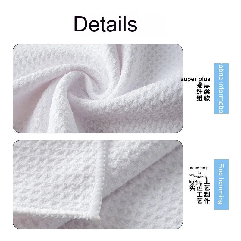 Waffle weave pineapple lattice golf ball cleaning cloth towel in assorted colours on a green.