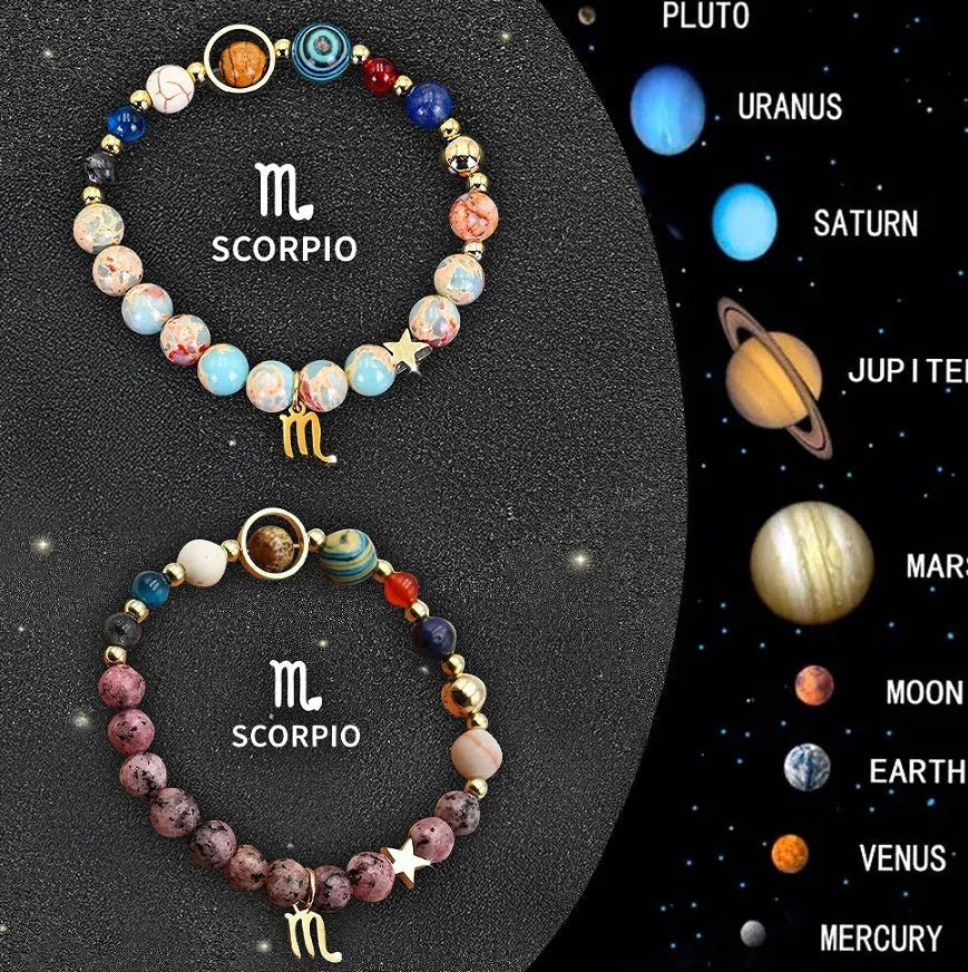 Two adjustable natural stone beaded bracelets with silver zodiac charms on a flat surface.